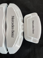 Білі кастомні накладки на гальмівні супорти Mercedes Benz, комплект із 4 шт.