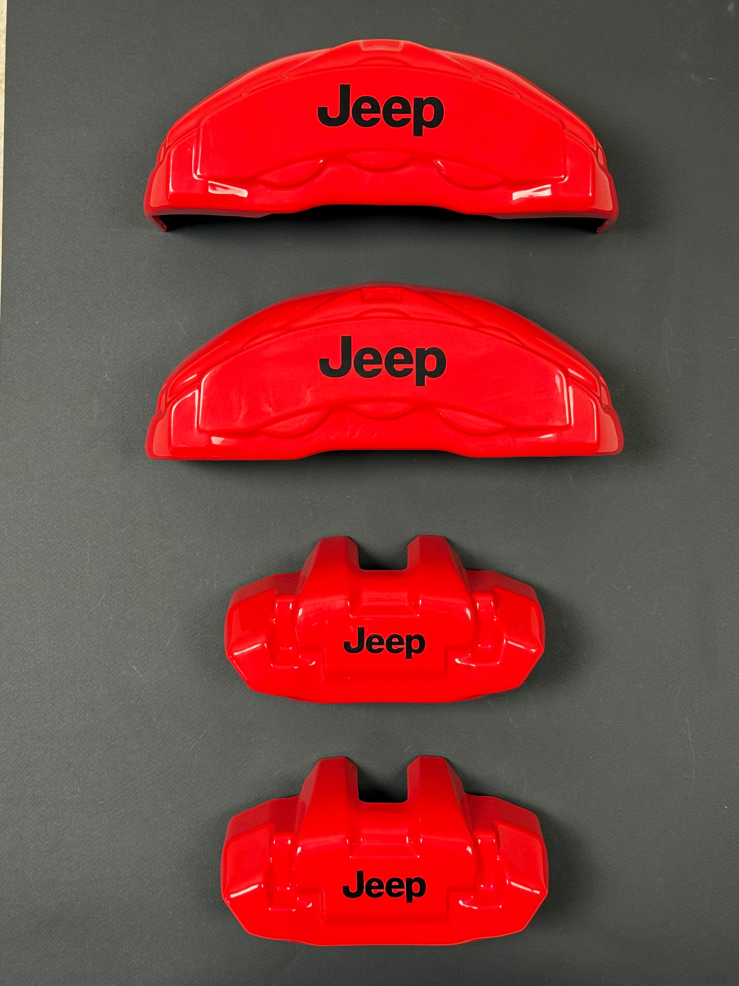 Червоні декоративні накладки на супорти для Jeep Grand Cherokee 2012-2018, комплект з 4 штук