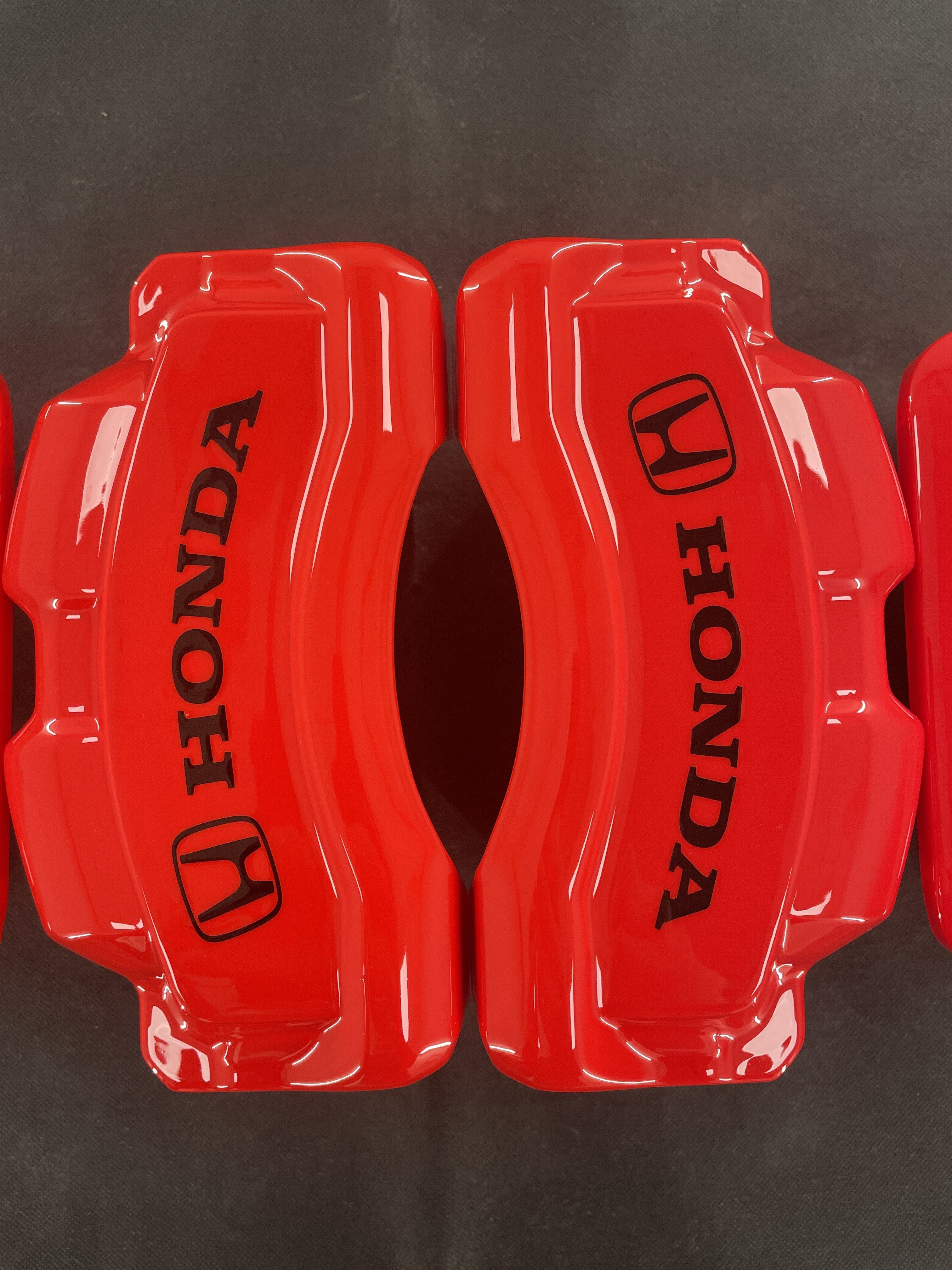 Червоні спеціальні накладки на гальмівні супорти Honda HR-V 2023-2025, комплект з 4 шт.