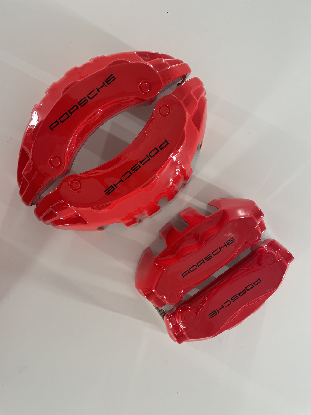Porsche Cayenne Panamera 2016-2020 червоні накладки на гальмівні супорти, комплект з 4 шт.