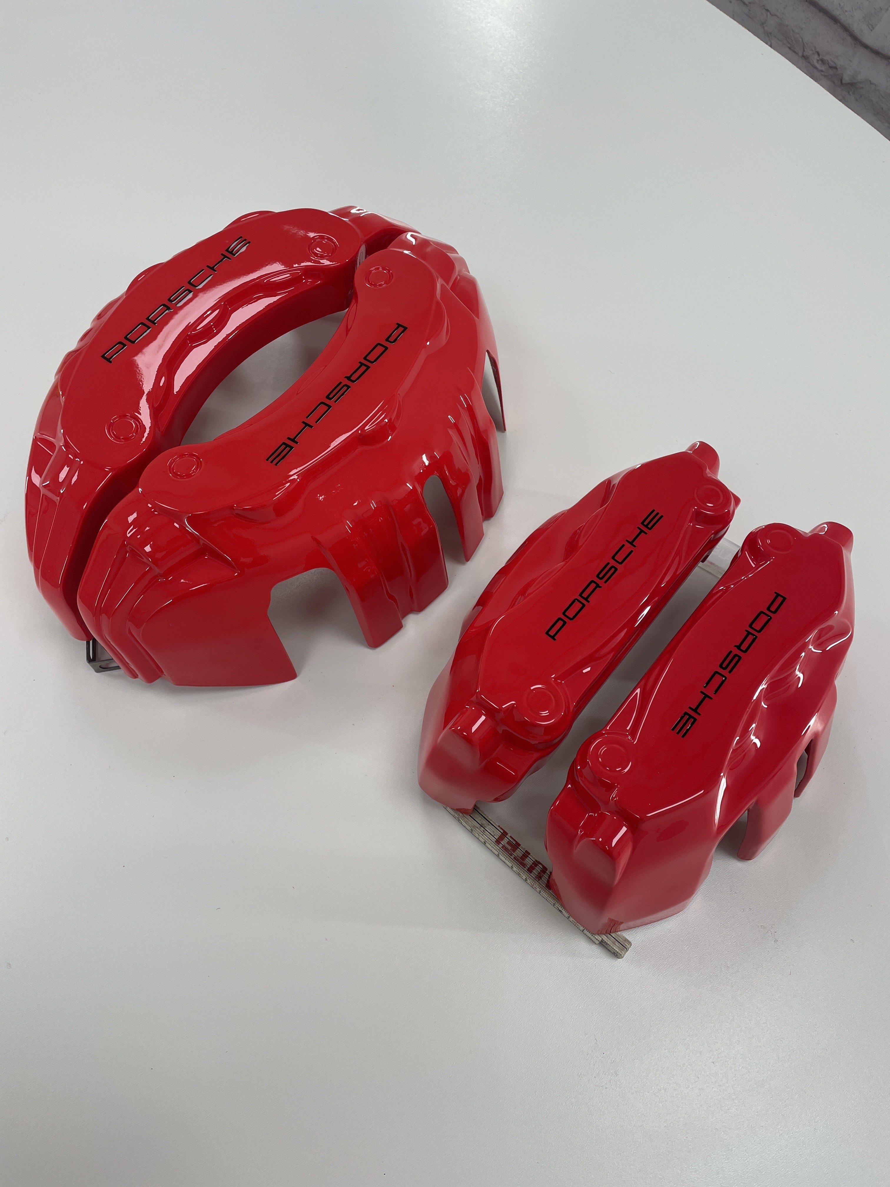 Porsche Cayenne Panamera 2016-2020 червоні накладки на гальмівні супорти, комплект з 4 шт.