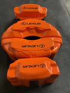 Помаранчеві кастомні спортивні накладки на супорти Lexus, комплект із 4 шт.